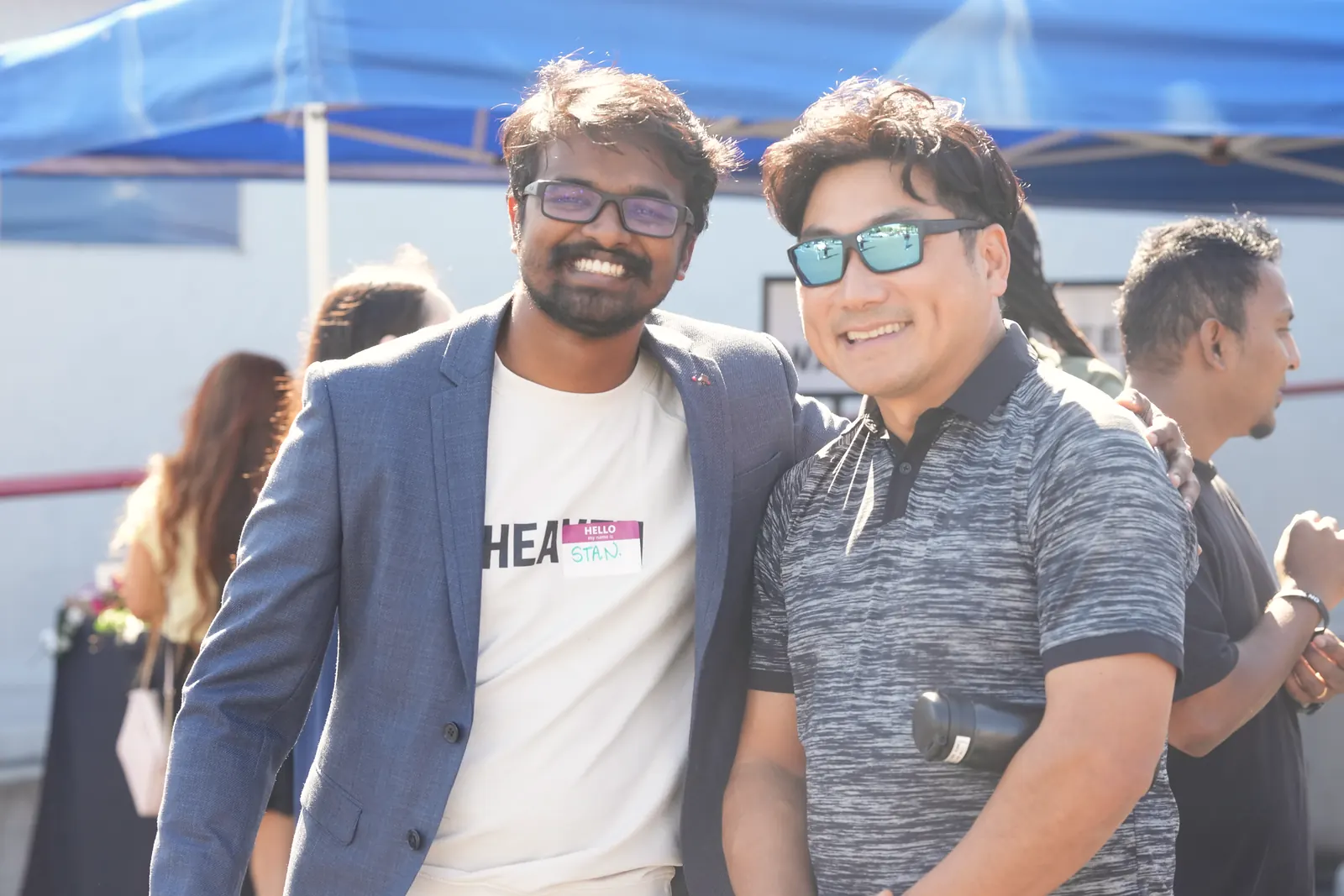 Two friends smiling together outside Hue.Church on October 18, 2026
